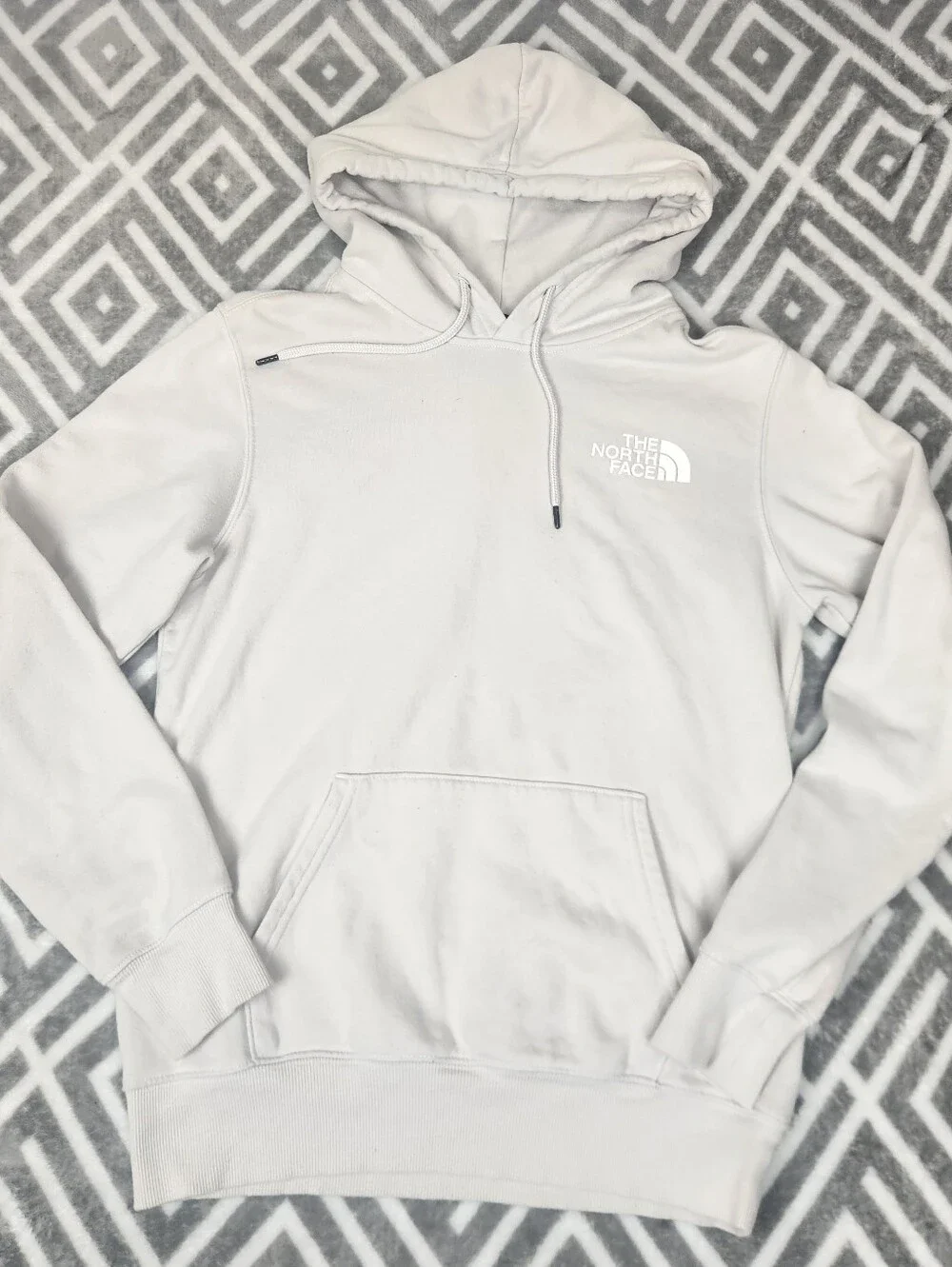 The North Face Never Stop Exploring Cream Hoodie with Blue & Purple Graphic